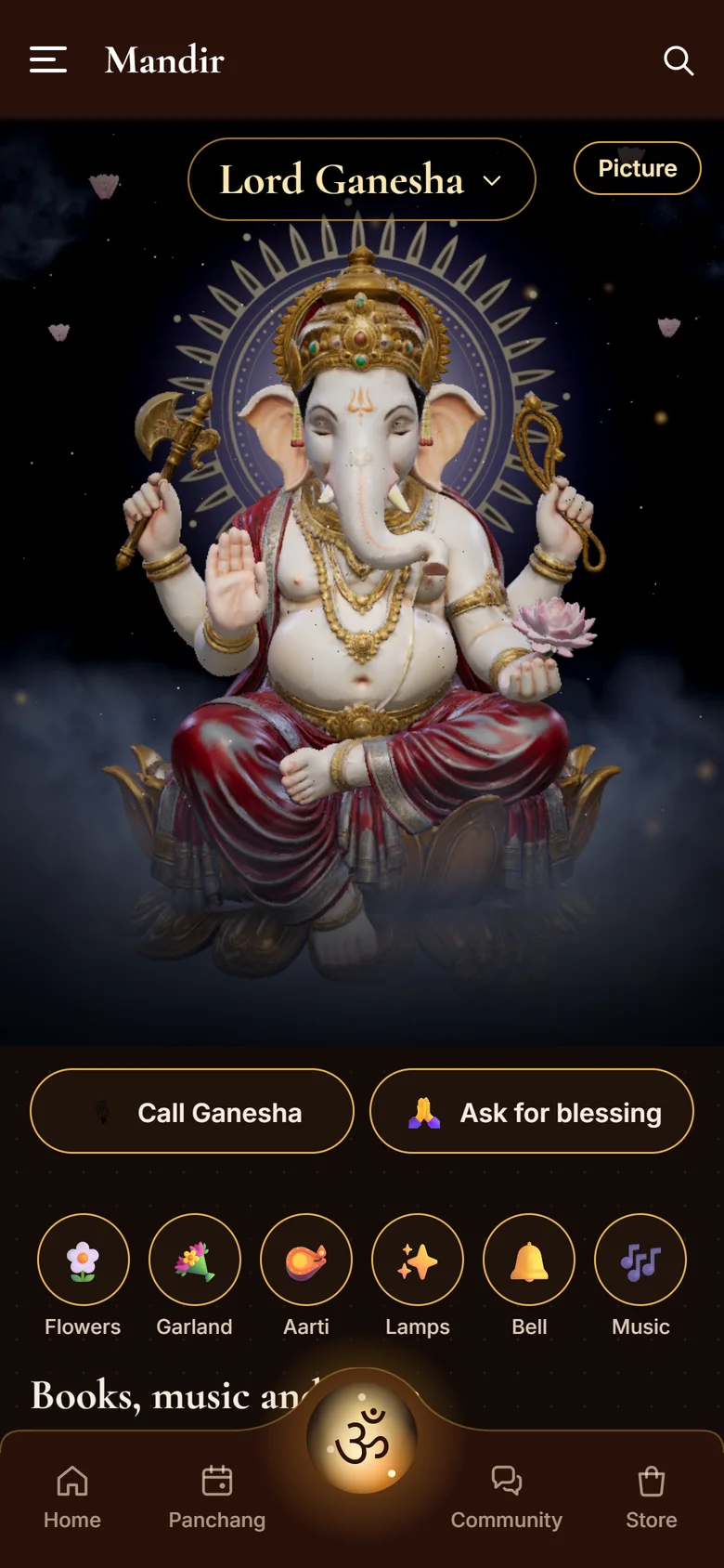 Moksham: The mandir: Lord Ganesha, or the deity you choose, with flowers, aarti and lamps.